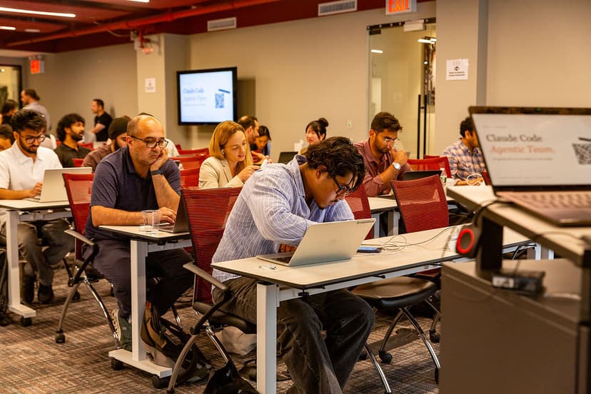 Participants building Claude workflows during a live training session